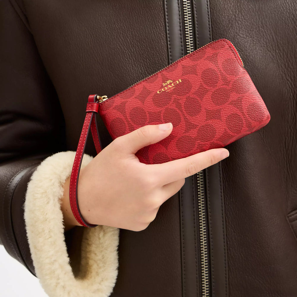 Coach Outlet Corner Zip Wristlet In Signature Canvas