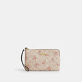 Coach Outlet Large Corner Zip Wristlet In Signature Canvas